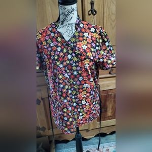 Peaches scrub top with tie waist. Size small.